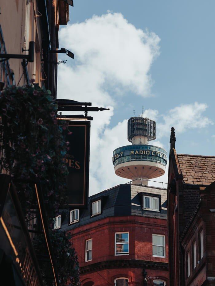 radio city tower liverpool behind roofs